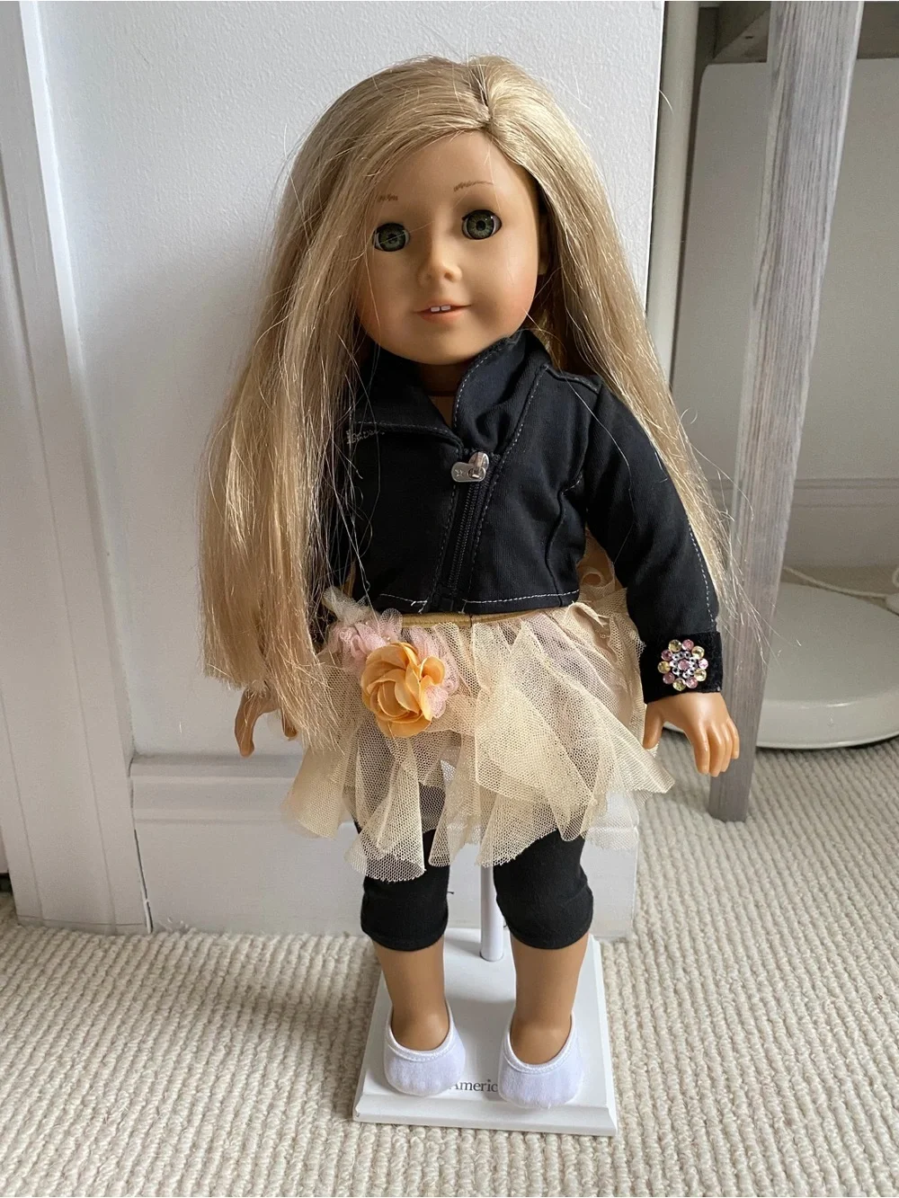 American Girl Isabelle doll with three outfits, ballet bar and two stands.